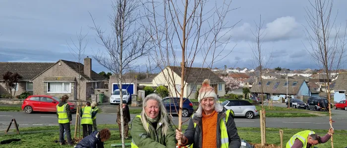 Dawn and Lynne planting a new Silver birch